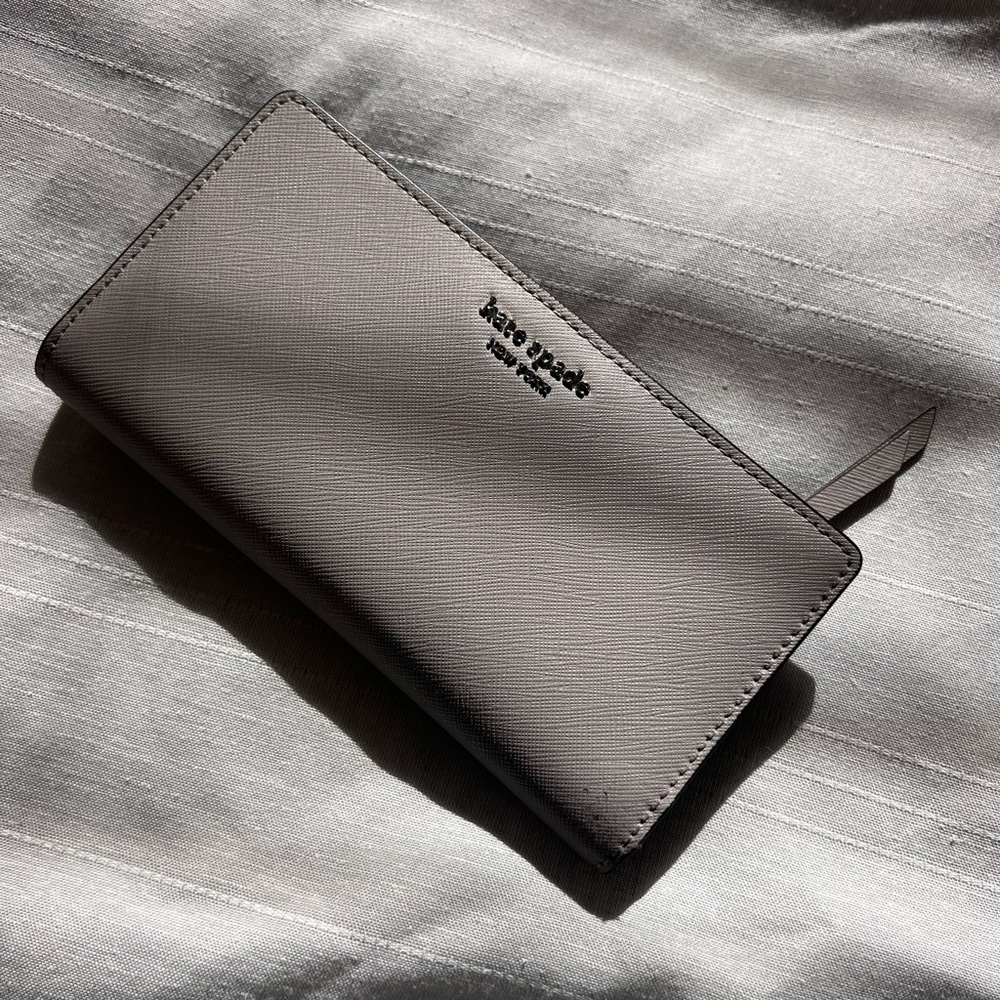 Gray Kate Spade Wallet in good condition.